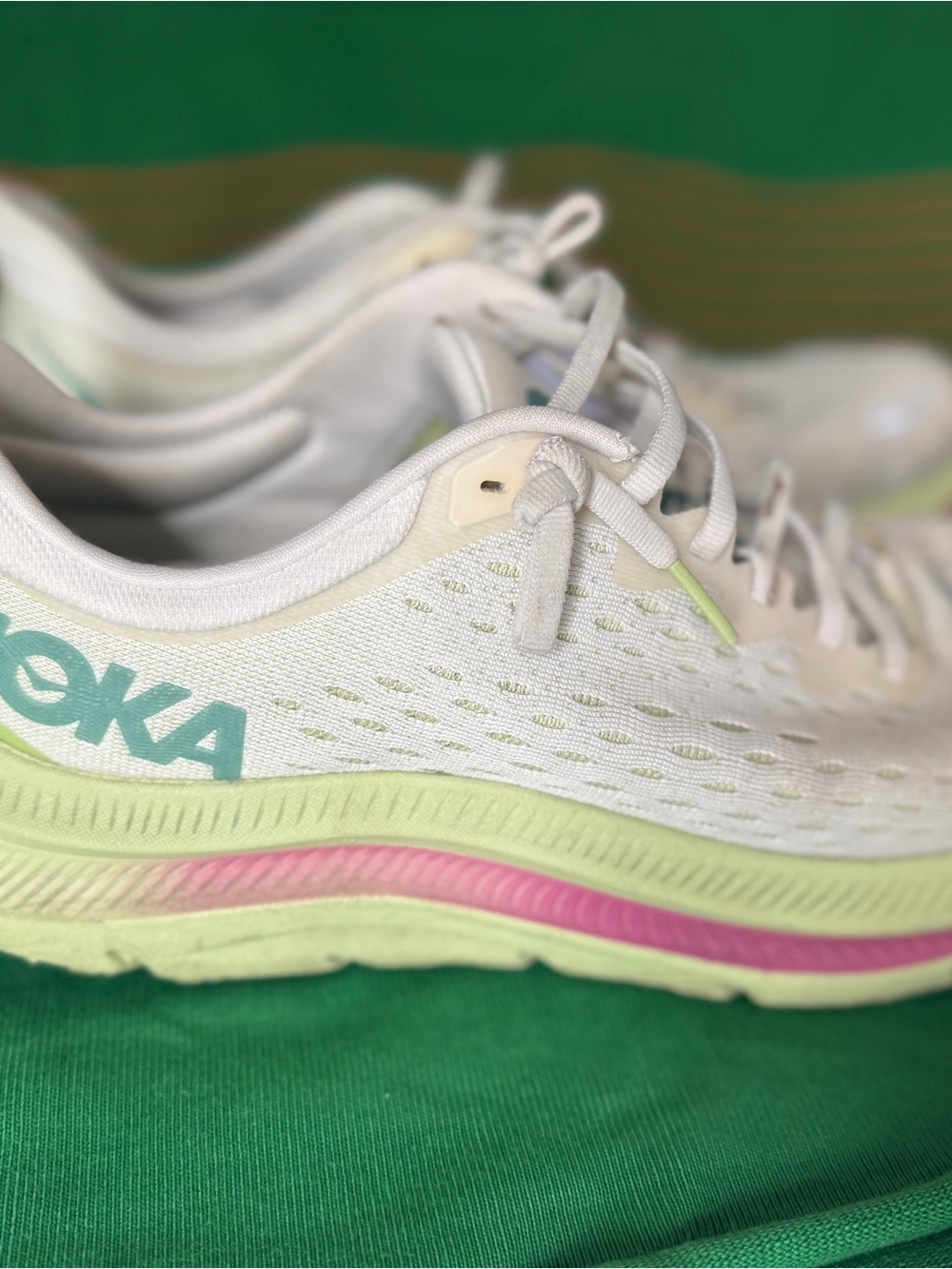 Hoka Women's White Running Shoe with Mint and Pink Accents